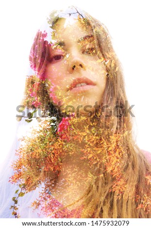 Similar – a girl with blue eyes and long hair covering herself with a gerbera flower