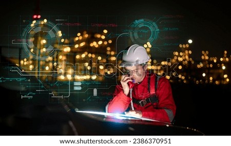 Double exposure Engineer team wear safety uniform stand in font of car hand holding blueprint , survey inspection site with double hologram industry to work with night lights oil refinery background.
