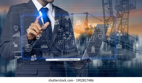 Double Exposure Engineering Using Laptop Computer Digital Technology Interfaces Icon With Construction Cranes No City Background.