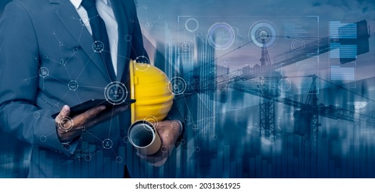 Double exposure of engineering using laptop computer and digital technology innovation interfaces icon with construction cranes no city blurred background. - Powered by Shutterstock