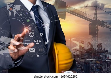 Double Exposure Engineering Using Tablet Digital Technology Interfaces Icon With Construction Cranes No City Background.