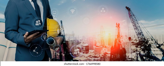 Double Exposure Engineering Using Tablet Digital Technology Interfaces Icon With Construction Cranes No City  Background, Background Toned Image Blurred.