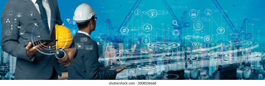 Double Exposure Engineering Using Tablet And Digital Technology Interfaces Icon With Construction Cranes On City Blurred Background.