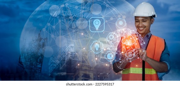 Double exposure engineering working with digital technology interfaces icon and construction cranes on city background, Smart industry and digital technology and IOT software concept.