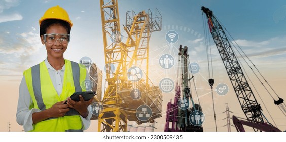 Double exposure engineering working with digital technology interfaces icon and construction cranes background, Smart industry and digital technology and IOT software concept.