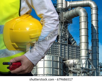 Double Exposure Engineers Industry Worker Holding Safety Helmet In Arms And Holding Walk Talky In Hands With Oil And Gas Refinery Background On Industry Concept,Pipelines And Petrochemical Plant