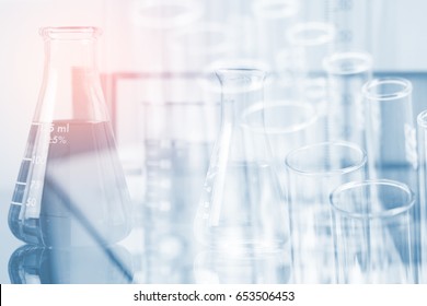 Double Exposure Of Equipment And Science Experiments ,Laboratory Glassware Containing Chemical Liquid, Science Research,science Background And Science Concept.