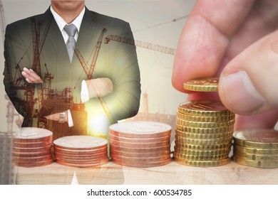 double exposure of Euro Coin stacks on table, businessman arms crossed, construction crane, building and sunset as business, investment,currency, exchange rate and industry concept - Powered by Shutterstock