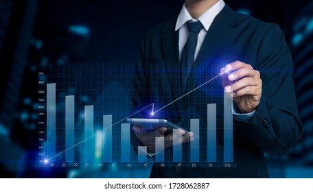 Double exposure of financial graph. Stock market chart. Businessman hand using tablet and stock market or forex graph, Forex investment business internet technology concept. - Shutterstock ID 1728062887