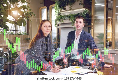Double exposure of financial and statistics graphs, Businessman and woman in suit discussing, team working, startup planning project together in office