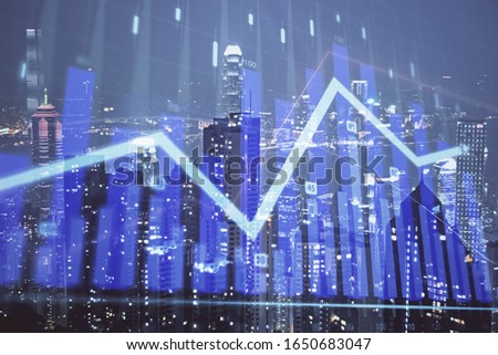 Double exposure of forex chart drawings over cityscape background. Concept of success.