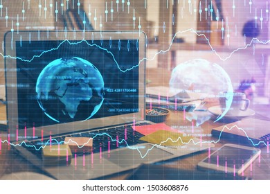 Double exposure of forex chart and work space with computer. Concept of international online trading.