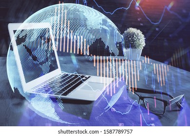 Double exposure of forex chart and work space with computer. Concept of international online trading.