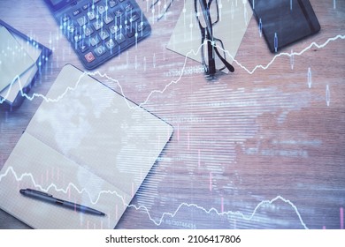 Double exposure of forex graph drawing and work table top veiw. Concept of financial analysis.
