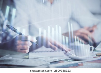 Double exposure of forex graph drawing over people taking notes background. Concept of financial analysis