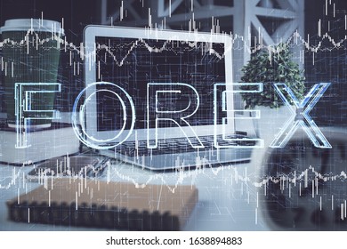 Double exposure of forex graph and work space with computer. Concept of international online trading.