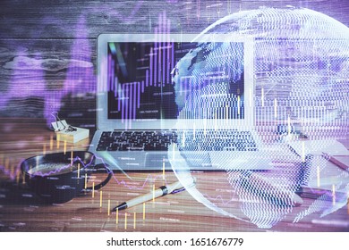 Double exposure of forex graph and work space with computer. Concept of international online trading.