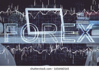 Double exposure of forex graph and work space with computer. Concept of international online trading.