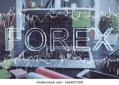 Double exposure of forex graph and work space with computer. Concept of international online trading.