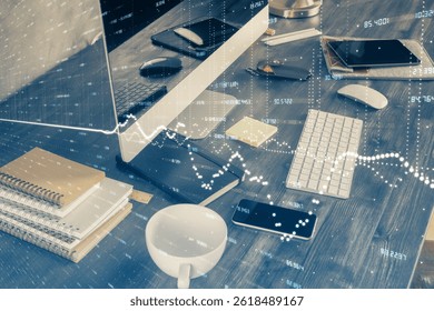 Double exposure of forex graph and work space with computer. Concept of international online trading.