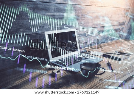 Double exposure of forex graph and work space with computer. Concept of international online trading.