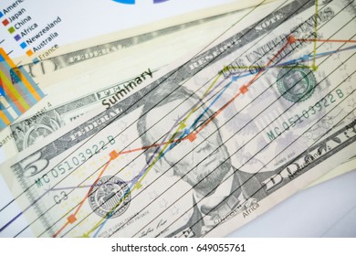Double exposure of graph and dollars banknotes  for finance and business concept