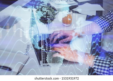 Double exposure of graph with man typing on computer in office on background. Concept of hard work. - Shutterstock ID 1531931972