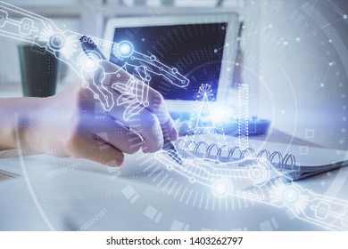 Double exposure of hands making notes with digital coding icons. Computer learning concept.