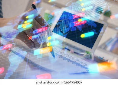 Double exposure of hands making notes with digital coding icons. Computer learning concept.