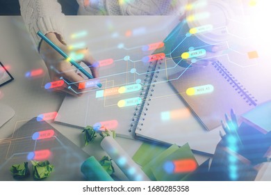Double exposure of hands making notes background with technology and digital coding huds. Data learning concept.