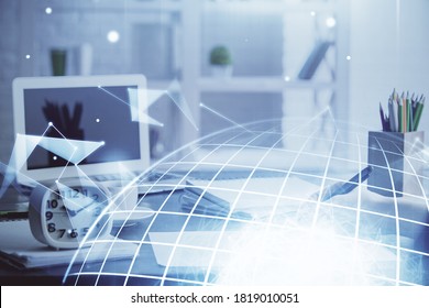 Double exposure of hands making notes with world map hologram and data theme icons. Concept of international network data.