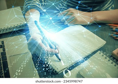 Double exposure of hands making notes with digital coding icons. Computer learning concept.