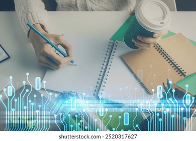 Double exposure of hands making notes background with technology and digital coding huds. Data learning concept.