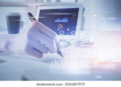 Double exposure of hands making notes with digital coding icons. Computer learning concept.