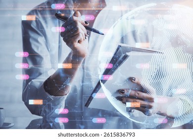 Double exposure of hands making notes with world map hologram and data theme icons. Concept of international network data.