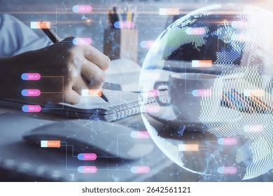 Double exposure of hands making notes with world map hologram and data theme icons. Concept of international network data.