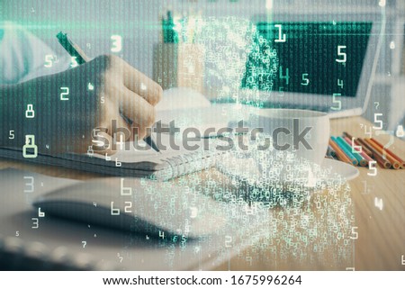 Double exposure of hands making notes with digital coding icons. Computer learning concept.