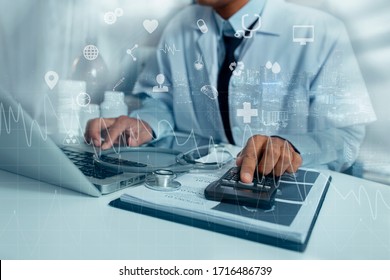 Double exposure of healthcare And Medicine concept. Doctor using Calculator with laptop and modern virtual screen interface icons. - Shutterstock ID 1716486739
