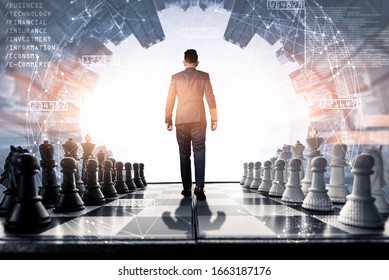 The double exposure image of the business man standing back during sunrise overlay with futuristic cityscape image. The concept of modern life, business, city life and internet of things.