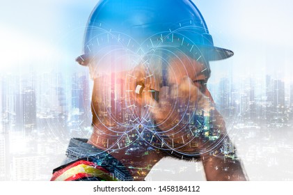 The double exposure image of the engineer use headset overlay with night cityscape image and futuristic hologram. The concept of telecom,5g,engineering, construction, city life and future. - Powered by Shutterstock