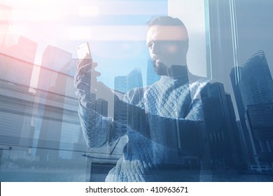 Double Exposure Image Man Making Photo Smartphone.Picture Bearded Trader Manager In Modern Office Panoramic View.Contemporary City Skyscrapers Background. Film And Bokeh Effect.Horizontal