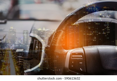 Double Exposure Interior Car Console And Cityscape At Night Background.