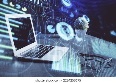 Double exposure of laptop computer and technology theme hologram. Concept of freelance work.