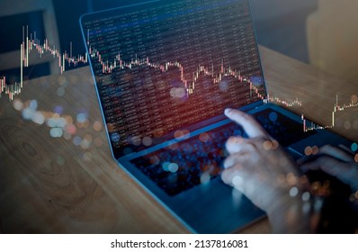 Double Exposure Of Laptop With Various Type Of Financial And Investment Products In Bond Market. I.e. Crypto Currency, Bonds, Stocks. Sustainable Portfolio Management.