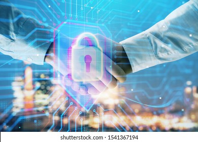Double exposure of lock icon hologram on city view background with two people handshake. Concept of safe business