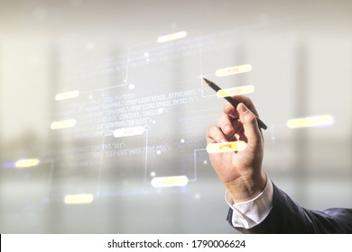 Double exposure of male hand with pen working with abstract programming language interface on blurred office background, research and development concept