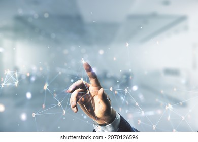Double exposure of male hand working with abstract virtual technology hologram on blurred office background. Research and development software concept