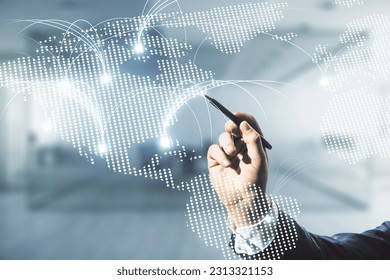 Double exposure of man hand with pen working with abstract digital world map hologram with connections on blurred office background, research and strategy concept