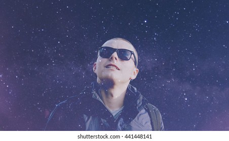 Double Exposure Of The Man And Night Stars