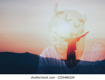 Double exposure. man praying and free bird enjoying nature on sunset background, hope concept 